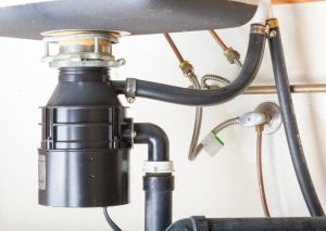 Garbage Disposal 101: How to Reduce Clogs, Service Your Disposal, and Maintain It