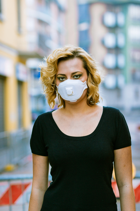 a woman wearing a mask